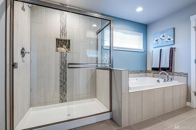 Master bath shower and tub (picture from model home - same f