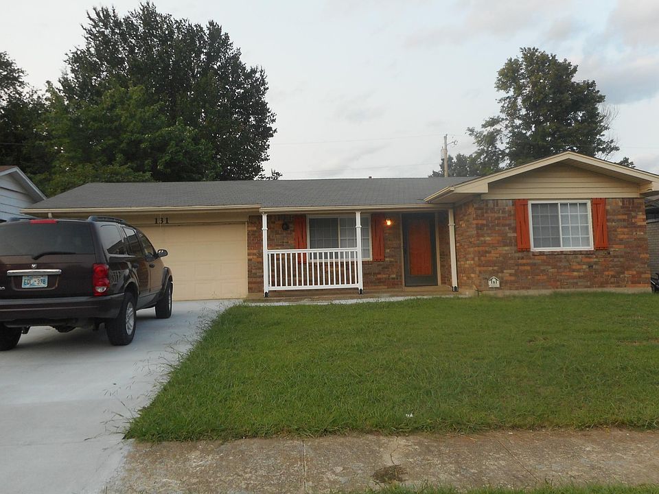 Front of home. New concrete driveway and sidewalk. Double ca