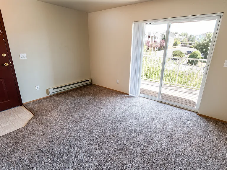 Living Room Leading to Private Patio/Balcony