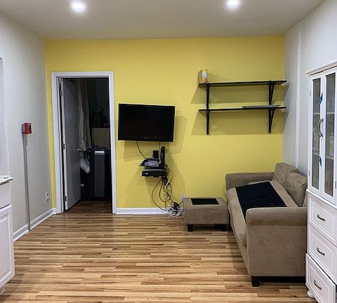 Open Area adjacent to Kitchen/bedroom door in view