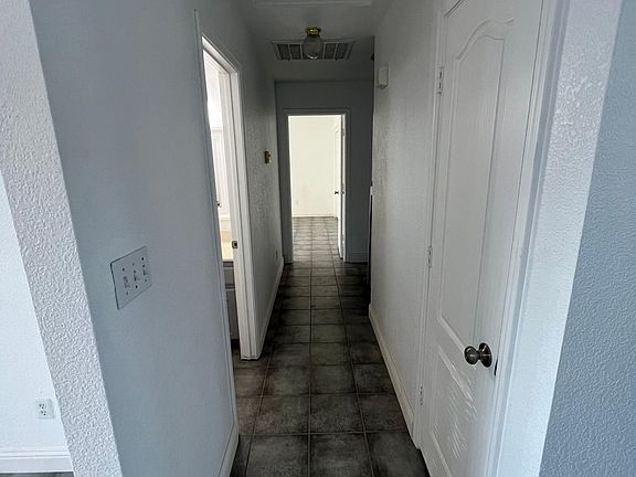 Hallway with closet and Cabinet storage