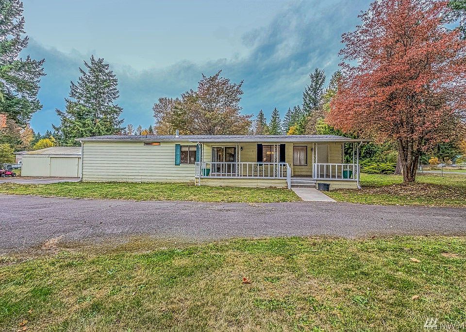 Cozy and cute home. Flat acreage surrounding while still maintaining mature trees and landscaping.