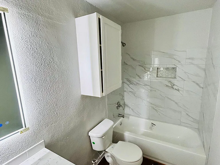 New bath tubs, new cabinets, new tiles around bathtubs, new faucets, new toilets