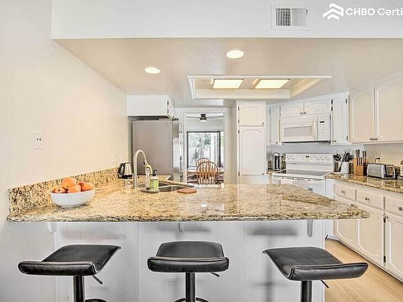 Kitchen counter view to dining