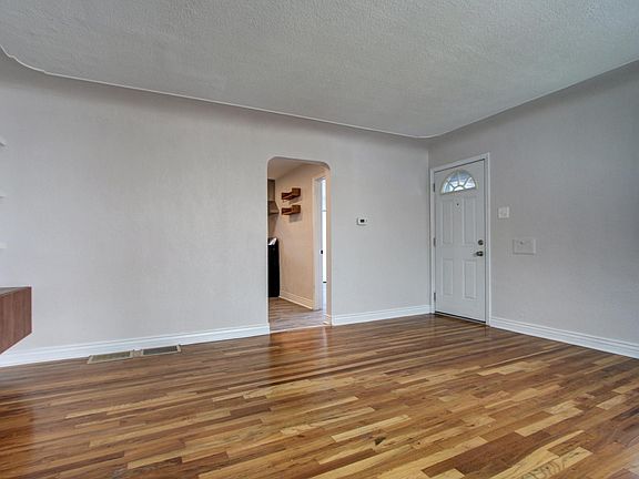 Move from your living room into the kitchen and bedroom spaces