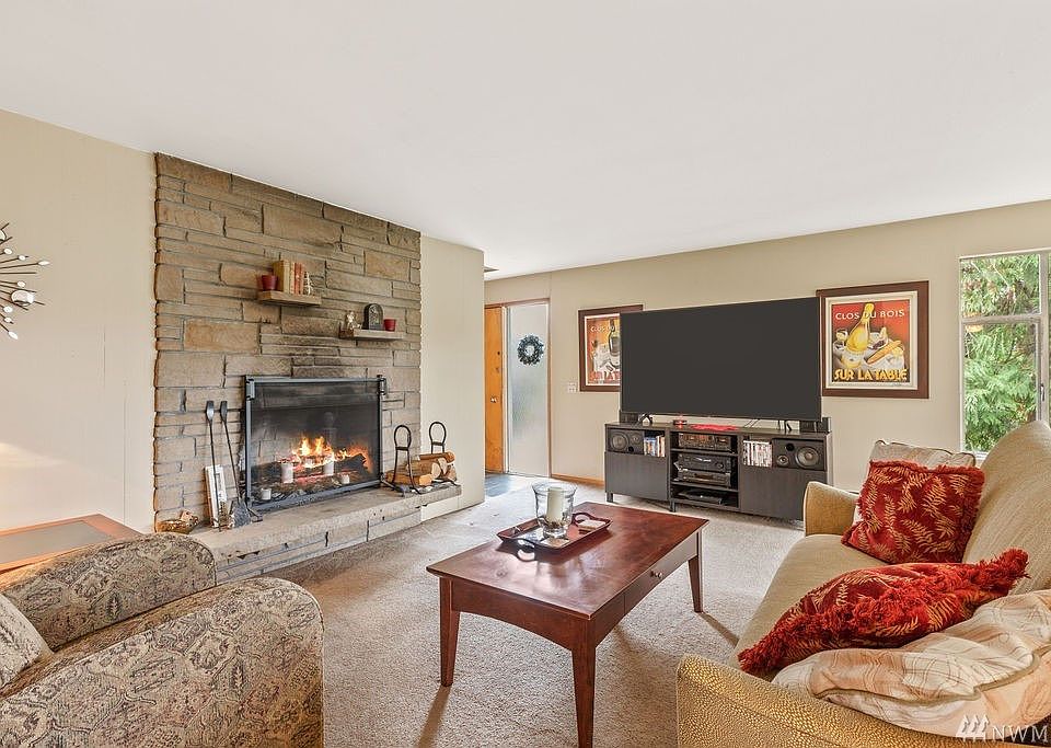 On chilly nights you can cozy up to the wood burning fireplace in this entertainment sized living room. 