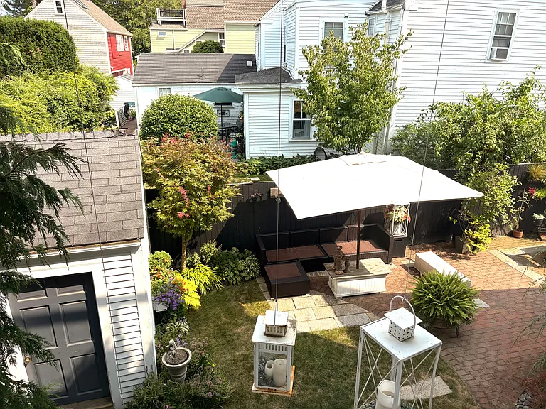 View of backyard from rear bedroom