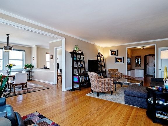 Living room looking toward the foyer and dining room to the left