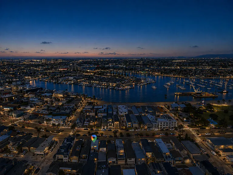 Aerial harbor views with boats and coastal scenery