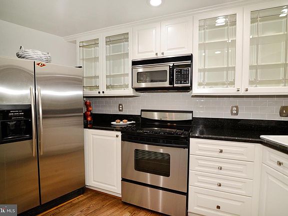 Kitchen counters and glass cabinets