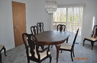 Dining room with sliders to deck