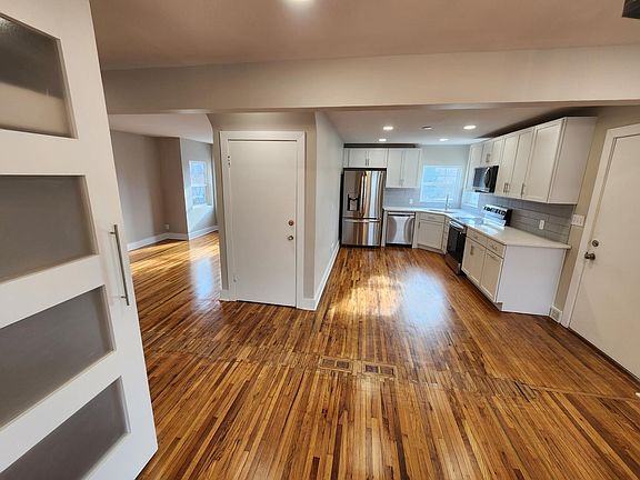 Dining room looking into open kitchen