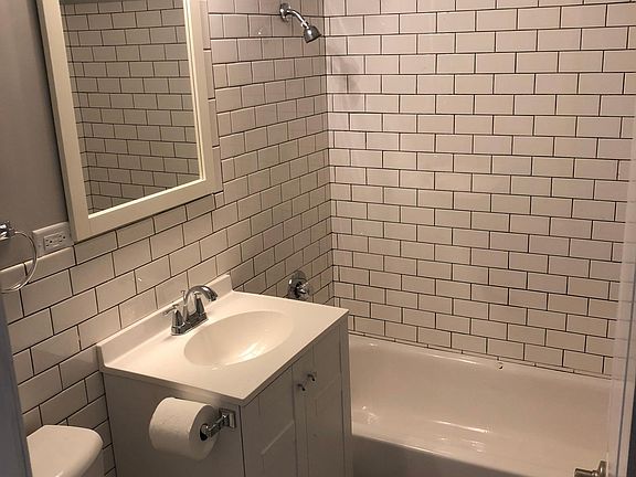 New Subway tile, new toilet, new vanity.