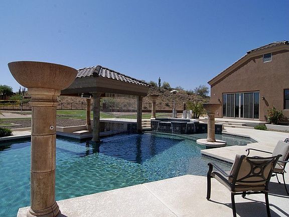 Luxurious Pool with Fire and Water Features