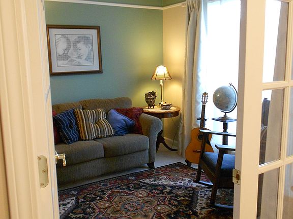 Quiet living room/study with french doors (our music rm/downstairs guest rm)