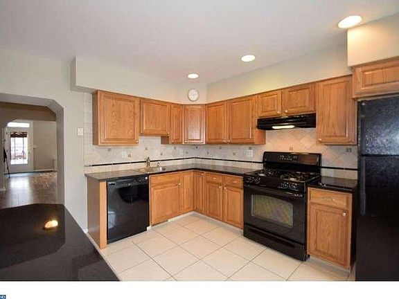 kitchen with breakfast room and access to rear yard