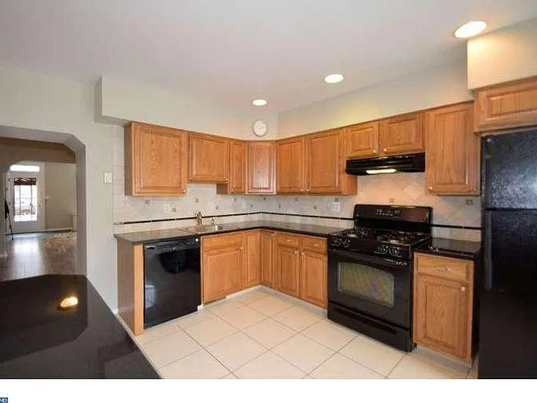 kitchen with breakfast room and access to rear yard