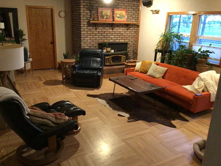 Large Main floor living room with wood fireplace