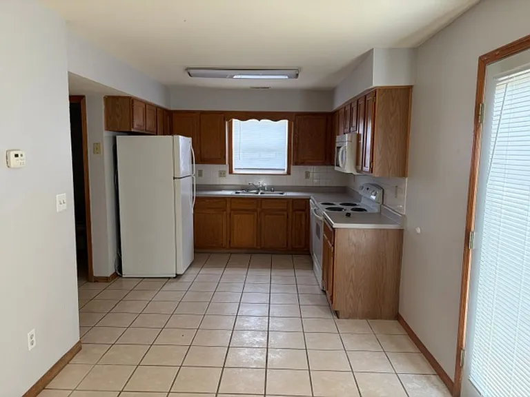 1201-1203 Bluestem Dr — Photo 3