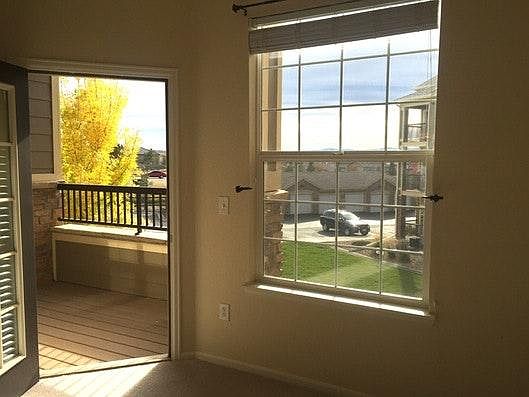 Balcony off of the living room with locked storage closet