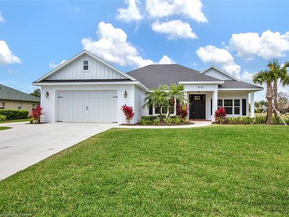 Front elevation of home with upgraded landscaping package.
