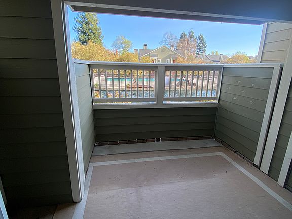 private balcony with lagoon, fountain, and pool/spa views (no rear neighbors)
