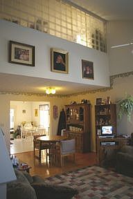 Vaulted Great Room 26'x 15' showing Loft/Office 