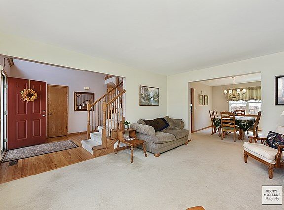 The living room is located just off the foyer and is open to the dining room.  You will love all of 