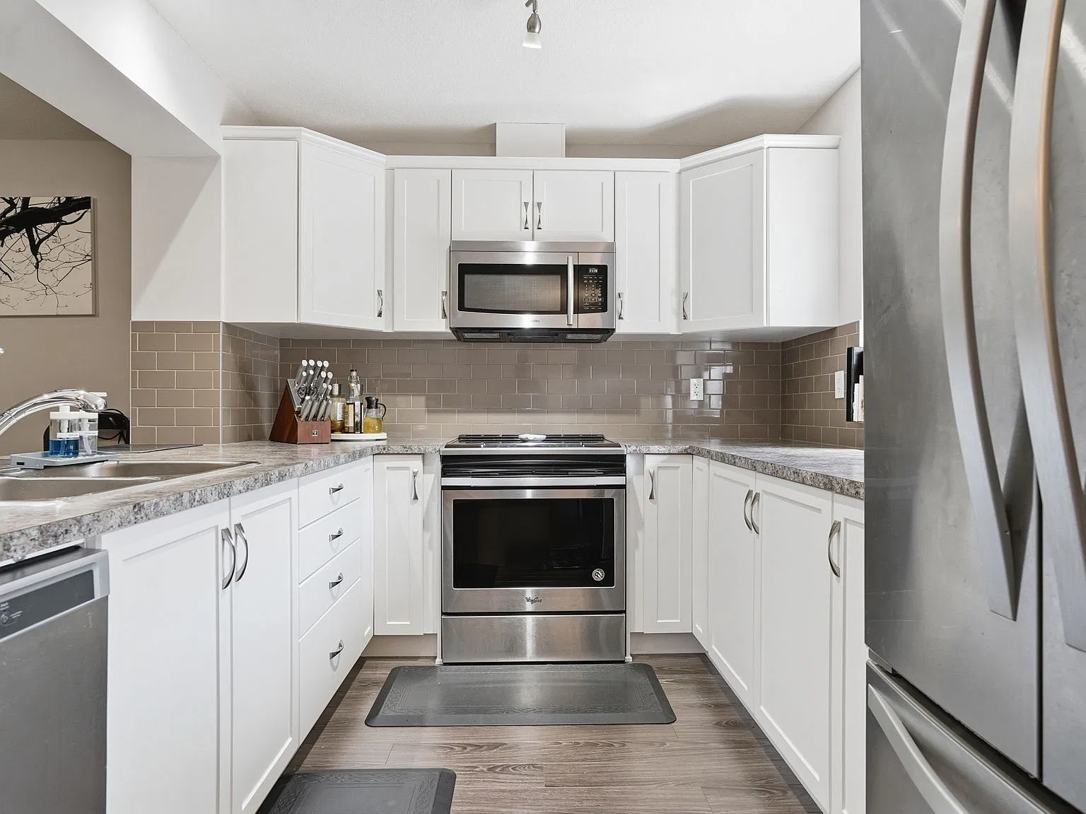 The Cityscape Townhome 2 Bed, 2.5 Bath with Heated Garage (L513) — Photo 1