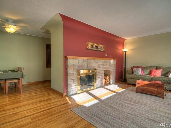 Bright living area with adjoining dining room