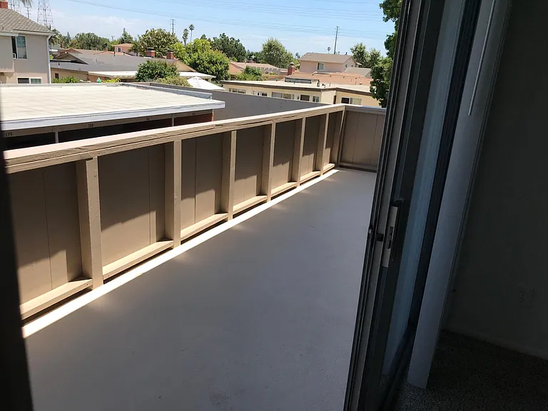 Standing at sliding glass door looking toward balcony 1x1