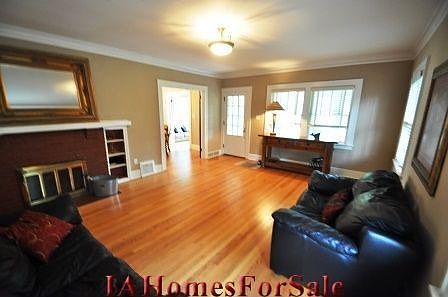 Spacious Living Room with Wood Burning Fireplace