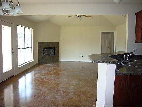 Cozy fireplace and patio access