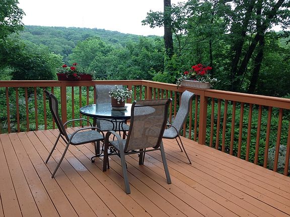 Upper deck 16 x 12 freshly painted offers scenic views off the deck. Corner lot offers total privacy as you entertain on your deck. Enjoy seasonal lake views just across the street.