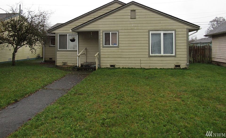Welcome to this charming bungalow situated in a quiet neighborhood, ready for your updates and style.