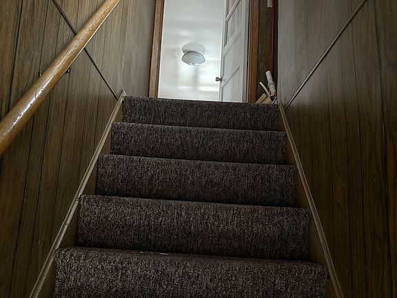 Stairs up to the unit.