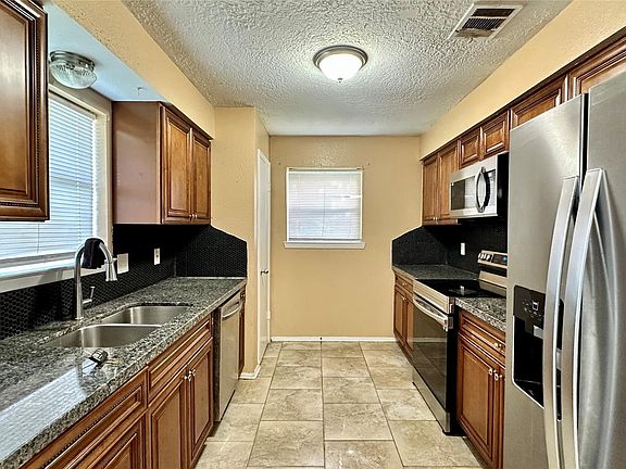 4th image of 8410 Garden Parks Dr
