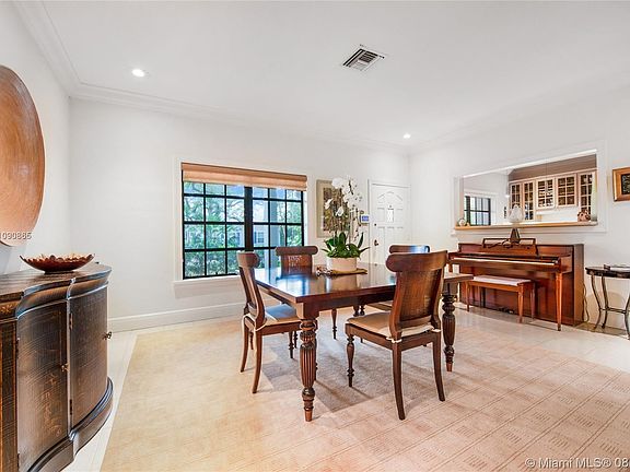 Formal Dining Room Opens Onto Eat-In Kitchen
