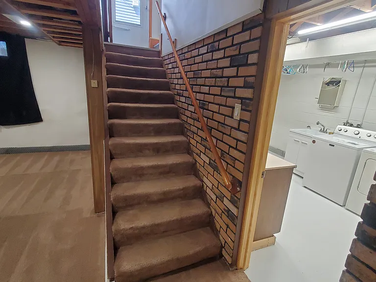 Basement. Utility room to the right.