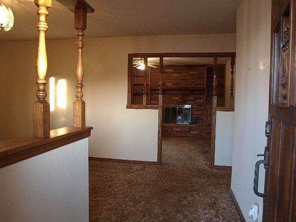 Entry through Formal Living into Family Room