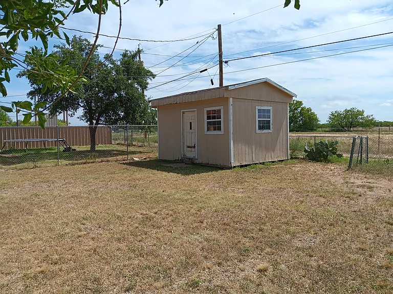 back yard with 16 x 12 storage shed