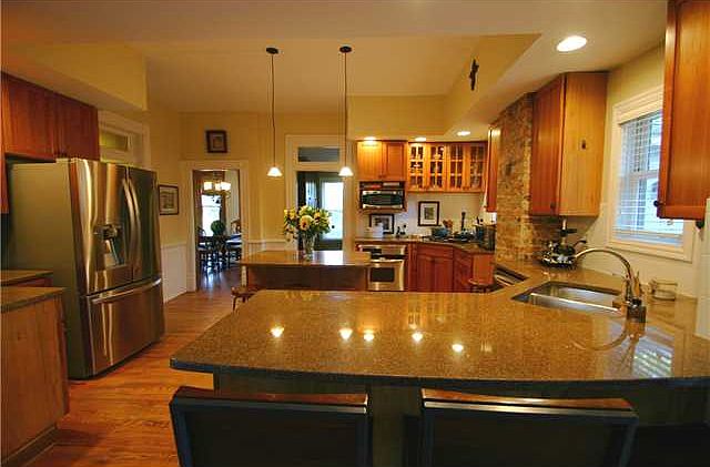 Gorgeous kitchen with cherry cabinets, huge walk in pantry, 1st floor laundry!