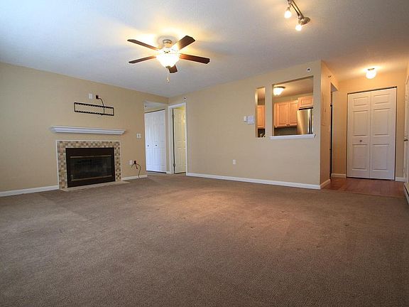 Living room with pass through to kitchen. Large pantry/close