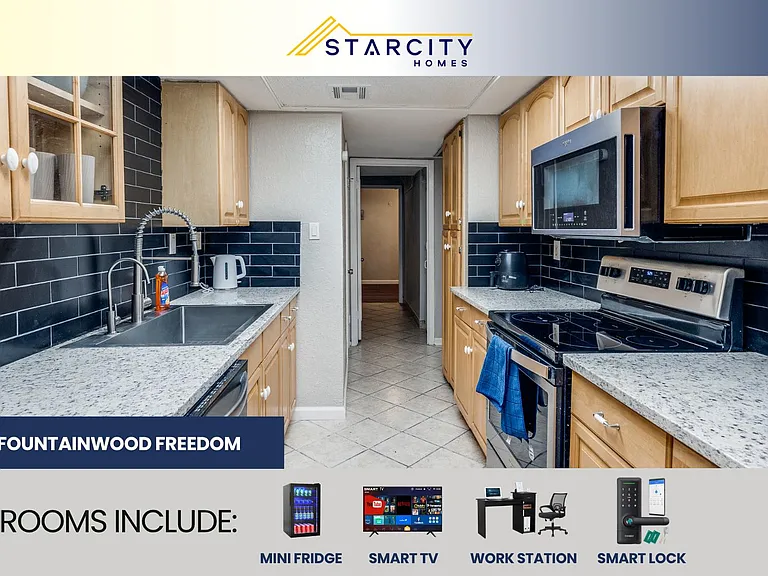 Galley kitchen with ample cabinetry, stone-look counters, tile backsplash, and stainless range with over-the-range microwave.