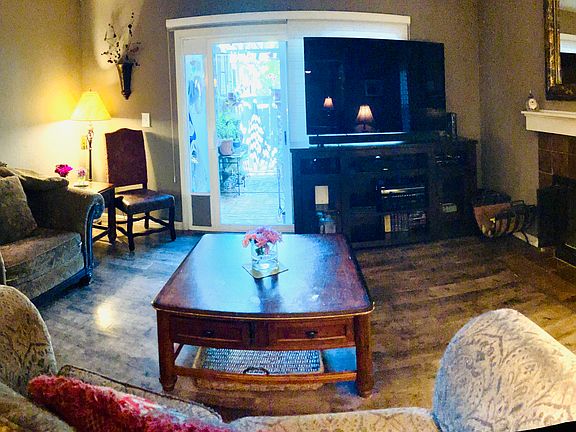 Panorama of living room and fireplace