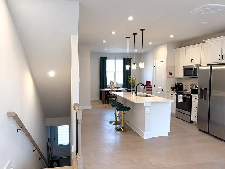 View of the open kitchen from the staircase