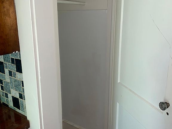 deep closet allows for a lot of storage space