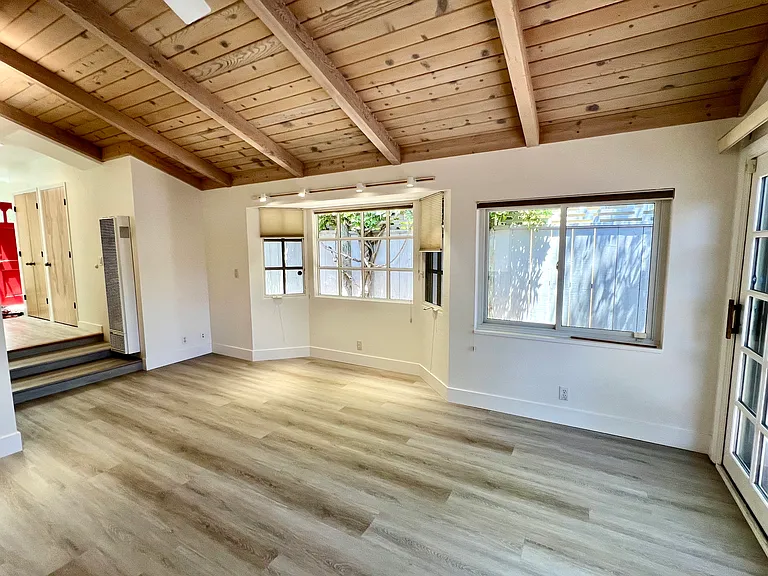 view from fireplace to dining room area
