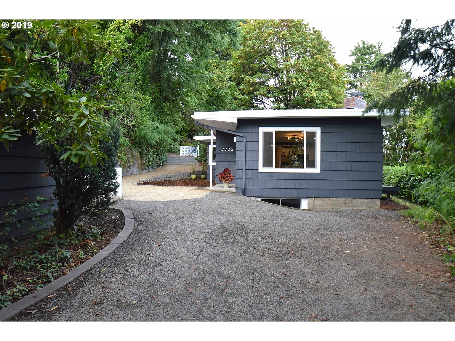 7726 SW 17th Dr photo 1