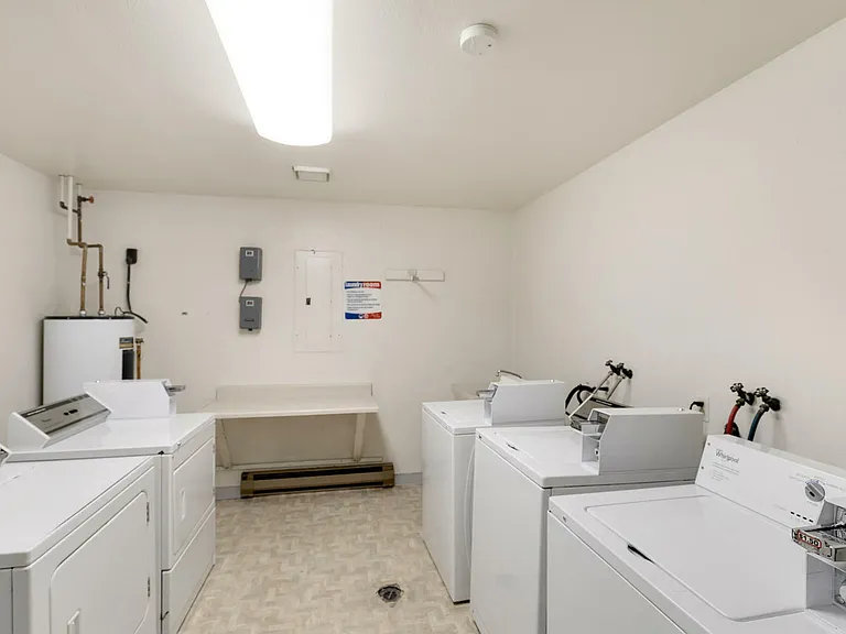 Efficient laundry room designed for convenience and ease. Efficient laundry room designed for convenience and ease.
